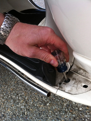 Boltunder the floor mat